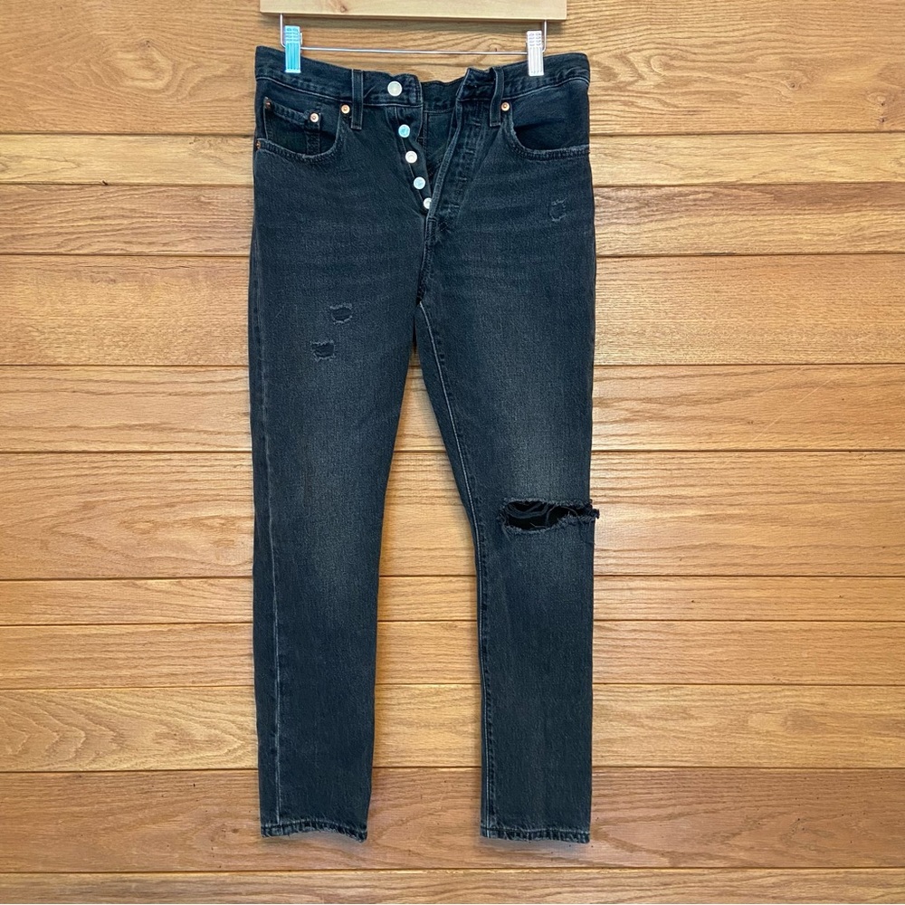 Levi's 501 button fly black busted knee jeans